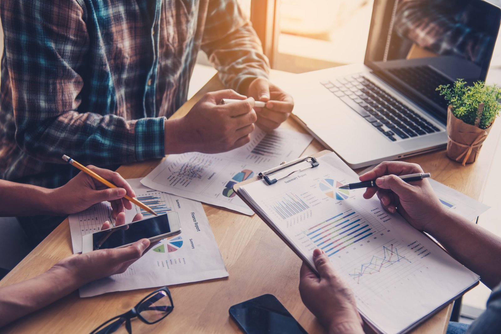 Team businessmans job . working with laptop in open space offic